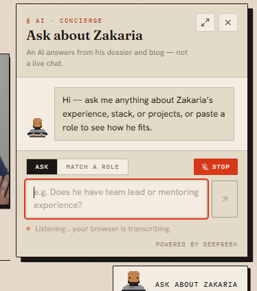 The concierge panel with the microphone live: the Dictate button has turned into a red Stop pill, the textarea still shows its example placeholder, and a muted line beneath it reads “Listening… your browser is transcribing.”